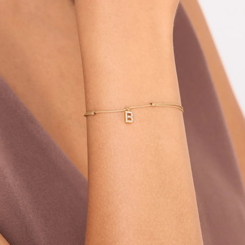 freundschaftsarmband_mit__1.webp Freundschaftsarmband mit Letter Charm, 14 Karat Gelbgold mit Diamanten-LEAF Outlet