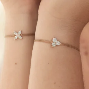 Glücksbändchen Triple Zirkonia,18 K Rosegold vergoldet,-LEAF Fashion
