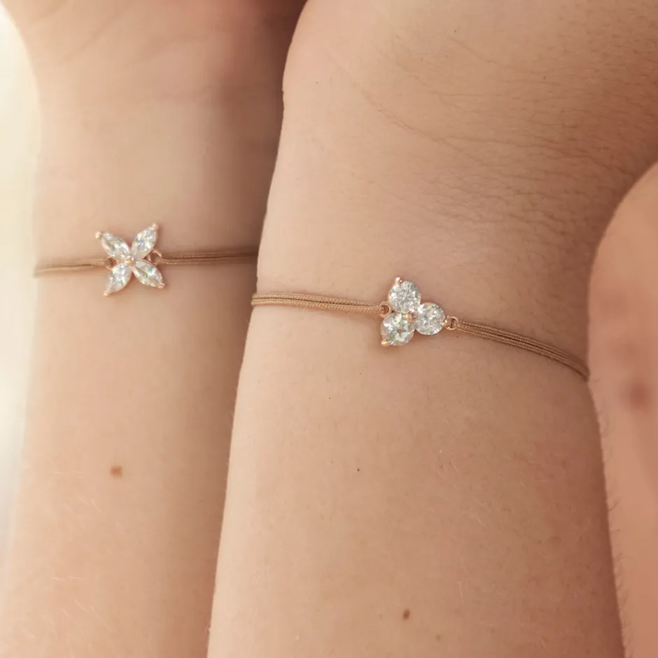 glcksbndchen_triple_zirko_1.webp Glücksbändchen Triple Zirkonia,18 K Rosegold vergoldet,-LEAF Fashion