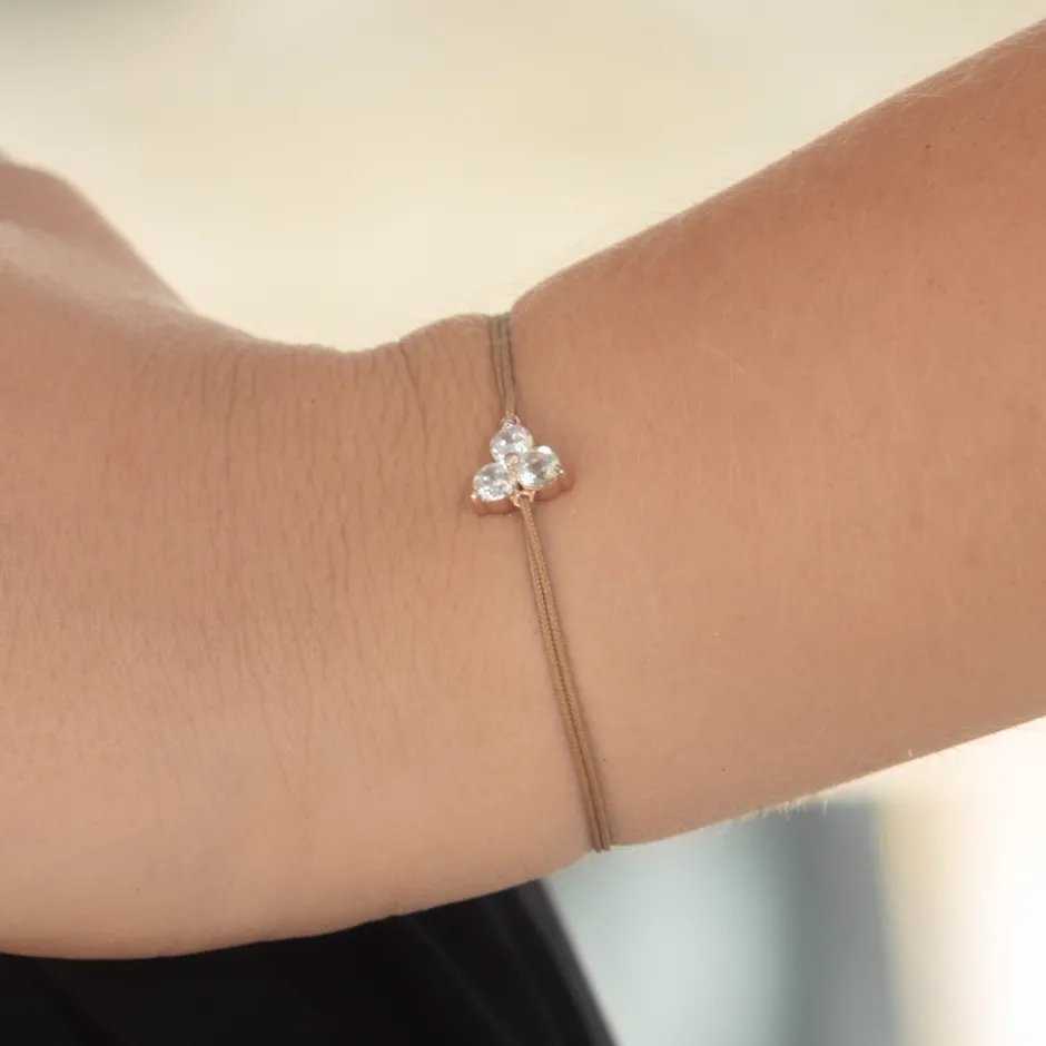 glcksbndchen_triple_zirko_2.webp Glücksbändchen Triple Zirkonia,18 K Rosegold vergoldet,-LEAF Fashion