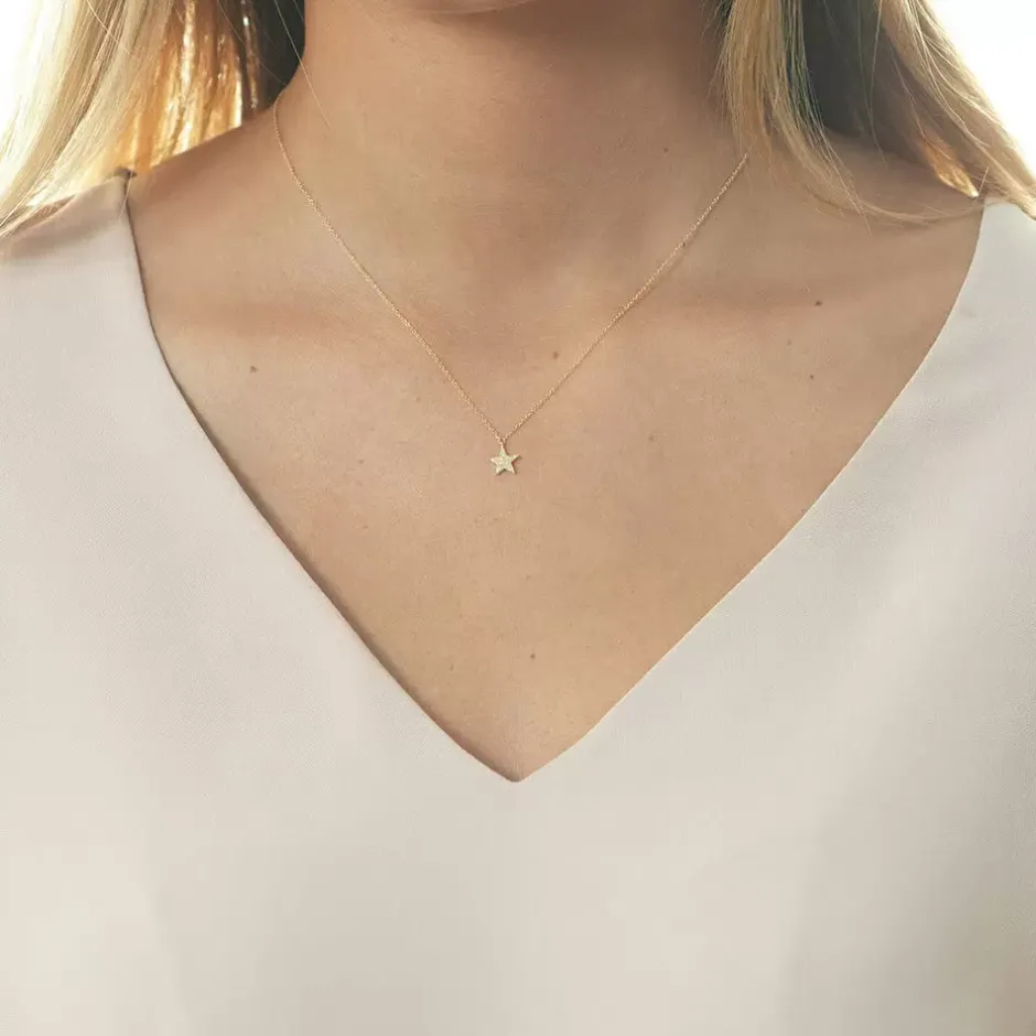 halskette_stern_mit_diama_1.webp Halskette Stern mit Diamanten, 18 Karat Gelbgold-LEAF Best